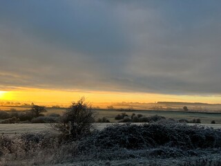 sunrise over the winter field