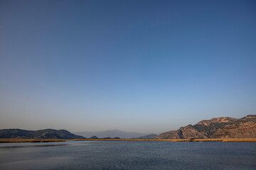 The natural lake on the Dalyan river delta just before dusk 