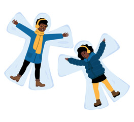 Kids enjoying winter by making snow angels on a snowy day in the park