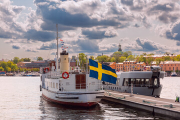 View of a historic old ship moored at a pier in Stockholm, Sweden