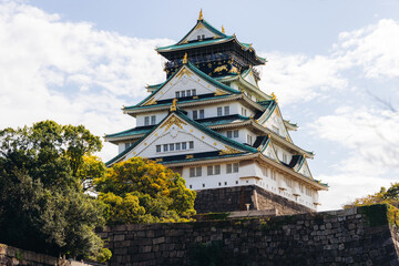 Fototapeta premium Osaka Castle, Osaka city, Japan, summer landscape vibrant view with a blue sky, Osakajo castle building, Kansai region, Osaka prefecture, travel to Japan