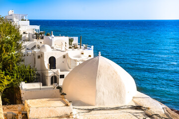 View of the roofs of white houses in the medieval medina of Hammamet, Tunisia.