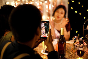 Friends Capturing Seventeenth Birthday Celebration Moments With Their Phones