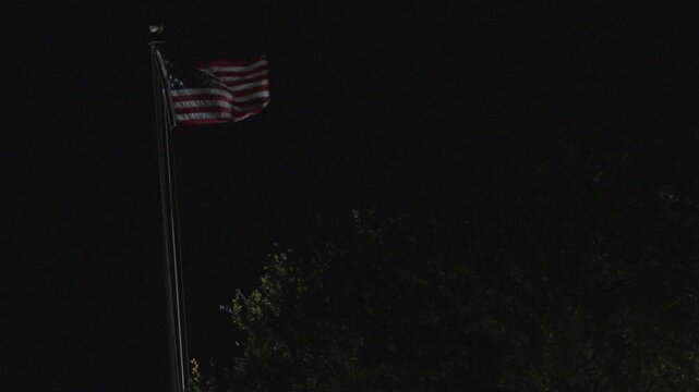 USA Flag waving at night in Austin, Texas 11/28/2024