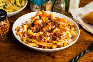 French fries with bacon and cheese