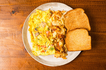 Omelette, potatoes and toast