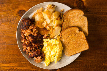Corned beef hash, potatoes and eggs