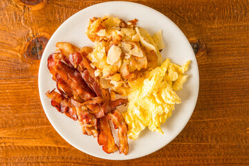 Bacon, scrambled eggs and potatoes