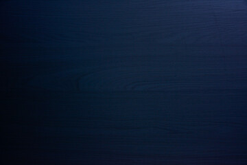 A close-up shot of a wooden texture background, showcasing a warm, natural wood grain pattern with subtle light and dark variations. Ideal for design, product display, or rustic themes.