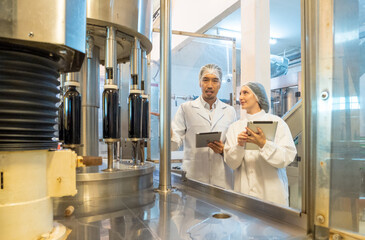 Engineer staff man and woman two person smile talk and inspect check quality control working job in...