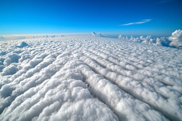 Obraz premium A close-up of wispy cirrus clouds stretching across a clear sky