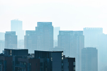 city skyline in the fog