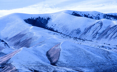 1st snow on mountain ridge