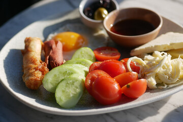 A Nutritious and Healthy Breakfast Platter Featuring Fresh Vegetables and a Dipping Sauce