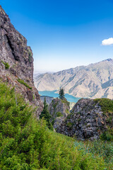Rock formations in Tianshan mountains next to Heavenly lake n Xinjiang, China. UNESCO World heritage