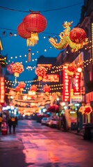 Obraz premium Illuminated night street scene with Chinese lanterns and dragon decorations.