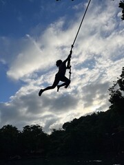 silhouette of a person jumping