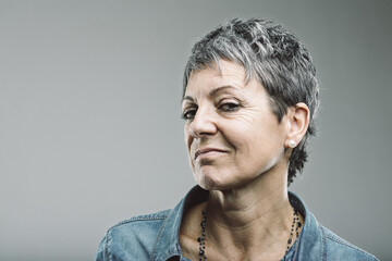 Mature woman expressing disappointment and negative emotions