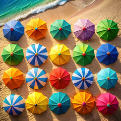 colorful beach umbrellas top down view on sandy beach