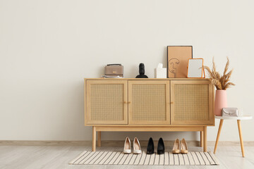 Obraz premium Interior of hallway with commode, table and shoes