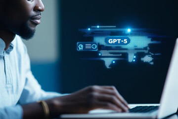 African male using laptop with gpt-5 interface