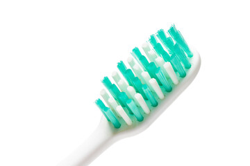 close up view of a toothbrush isolated on white background.