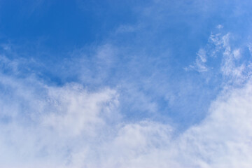 beautiful blue sky and white fluffy group of clouds with sunrise in the morning, natural background