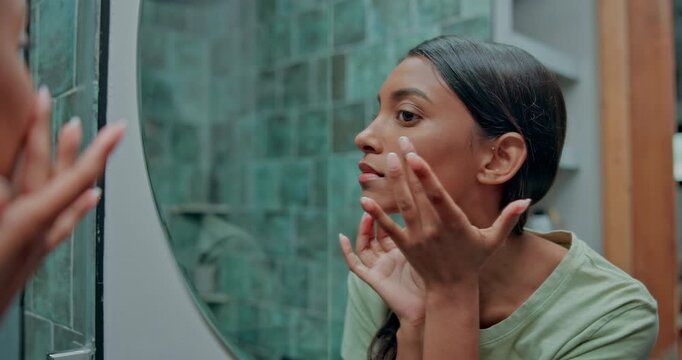 Woman, mirror or skincare with cosmetics, reflection or grooming for morning routine in bathroom. Female person, indian or dermatology with natural beauty for skin hygiene or facial treatment at home