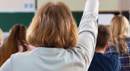 Back view of older student raising his hand to answer teacher's question during education training class. jpg ai image