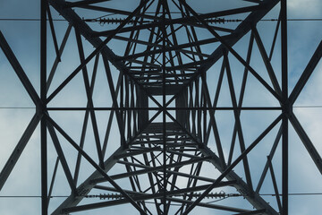 Abstract upward view of electricity pylon 