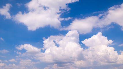 clear blue sky background,clouds with background, Blue sky background with tiny clouds. White fluffy clouds in the blue sky. 