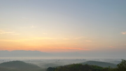Sunrise and morning fog