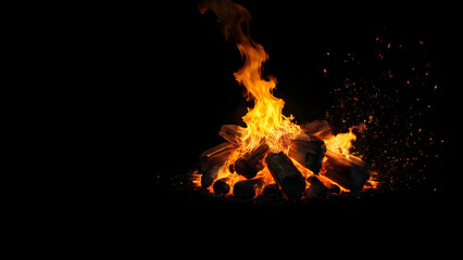 Burning coal isolated on black background