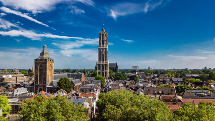 Naklejka premium Utrecht town аerial drone view from above, typical Dutch city skyline, Utrecht cityscape with tower, canals and houses, Holland, Netherlands
