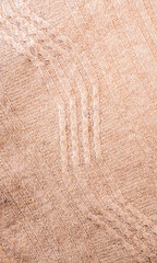 Beige Knitwear Fabric Texture with Pigtails. Beige Knitted Background.