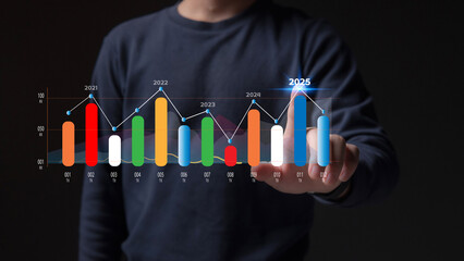 Businessman analyzes business growth plan in 2025, digital marketing strategy, revenue, profit, economy, stock market and business trends.