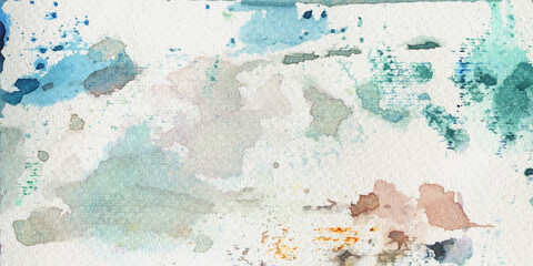 Color watercolor splashes on genuine paper. Colourful watercolour background. Abstract aquarelle brush strokes texture. Artistic banner template background.