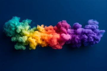 Fototapeta premium Vibrant Rainbow Smoke Explodes on Blue Background