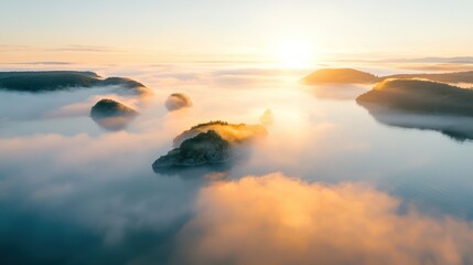 A serene sunrise over misty islands, casting a warm glow on the calm water, creating a picturesque and tranquil landscape.
