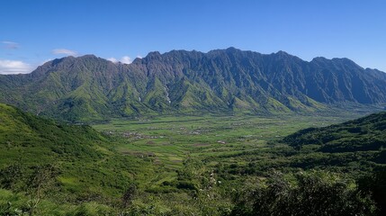 Mountain Range Overlooking Lush Valley