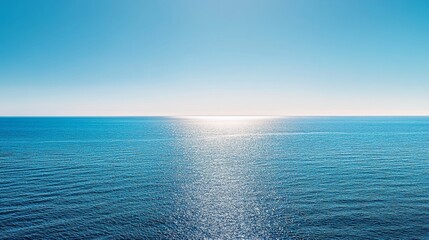 Obraz premium Photo of Serene Seascape with Clear Blue Water and Bright Sky on a Sunny Day