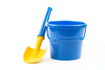Colorful kid beach toy for sand spading, Selective focus sand bucket at the beach isolated on white background, Bucket and spade for sand castle making.
