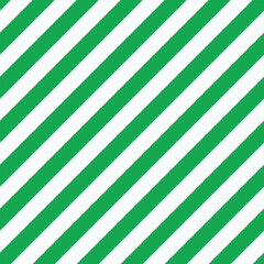 Candy cane background. Diagonal stripes seamless pattern. Peppermint wrapping texture. Green candy cane stripes. Vector illustration