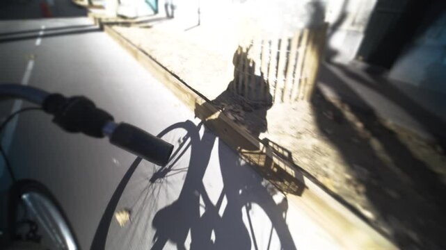 Person Entraina chooses an eco-responsible transport such as the city bike to get to work, to go for walks in the streets of the city of Montpellier located in France. High quality 4k footage