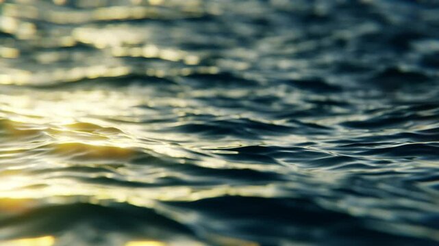 Close-up view of evening ocean waves in slow motion, seamless loop background