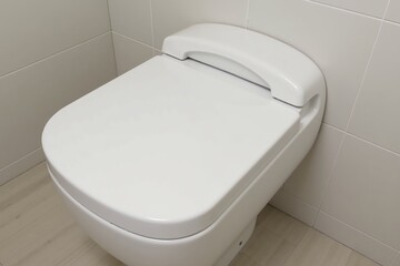 Modern minimalist toilet in clean bathroom setting with neutral tones and contemporary design.