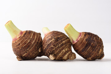 Fresh sweet taro on white background, organic local ingredient for healthy and vegetarian food