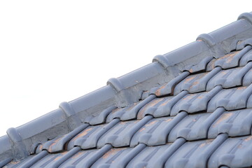 The blue triangular roof of the house in the afternoon