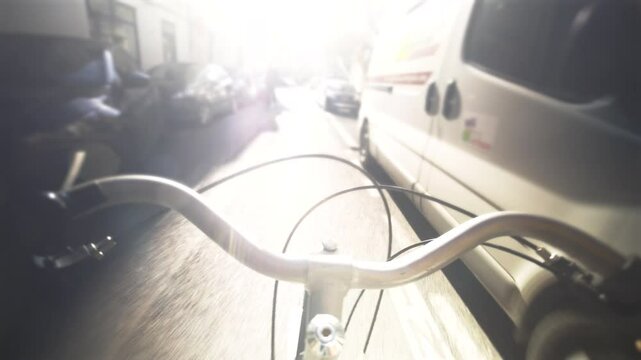 Person Entraina chooses an eco-responsible transport such as the city bike to get to work, to go for walks in the streets of the city of Montpellier located in France. High quality 4k footage
