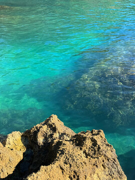 Cliff in the turquoise clear sea